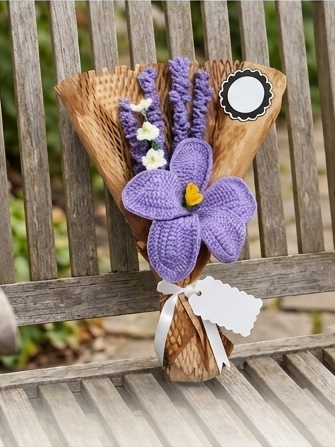 Handmade crochet purple bouquet on a wooden bench